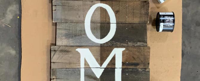 before and after pallet painted with hemp oil